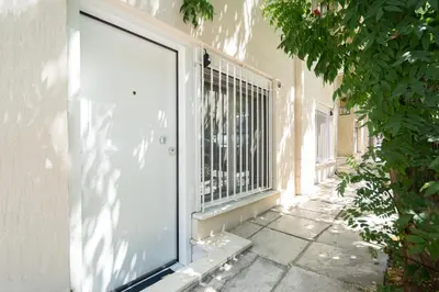 an open door of a building with a window at Cute and Convenient Studio in Athens Center in Athens