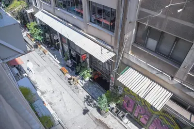 an overhead view of a city street with a building at Virginia's Boutique Apartments in Athens