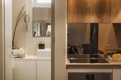 a kitchen with a sink and a counter at Sea view super romantic apartment in Athens