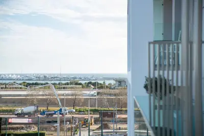 a view of an airport from a window of a building at The Convo Athens Riviera in Athens