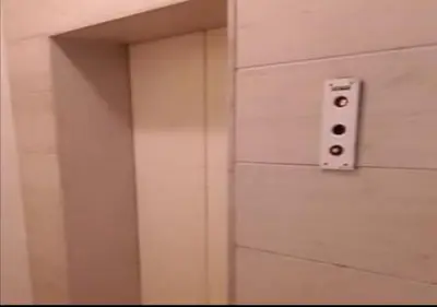 a bathroom door with a switch on the wall at House in the center of Piraeus next to the port and the metro!! in Piraeus
