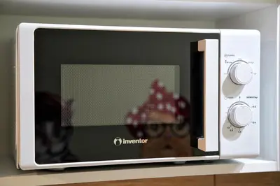 a microwave oven sitting on top of a counter at Your Attiki Home VIPGreece in Athens