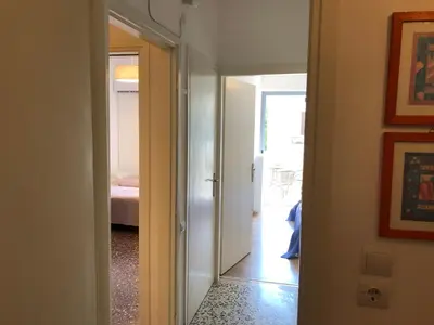 a hallway with a door leading to a bedroom at Metaxourgio spacious two bedroom apartment in Athens