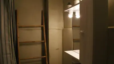 a room with a closet with wooden shelving at The Victoria Square Exceptional Apartments in Athens