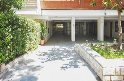 a hallway of a building with a walk way at Christina's flat in Athens