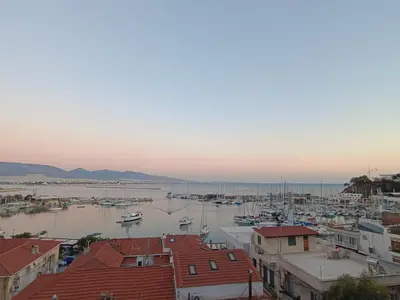 a view of a harbor with boats in the water at Uncle Tom's Penthouse in Piraeus