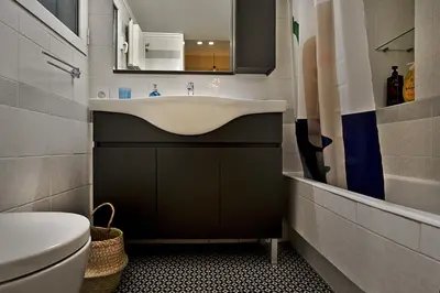 a bathroom with a sink and a toilet at Photographers House in Athens