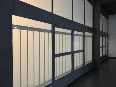a row of sliding glass doors in a building at Factory in Athens