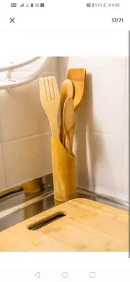 a wooden utensil holder with a knife and fork at Acropolis Elegant Maisonette by LODGESPOT in Athens