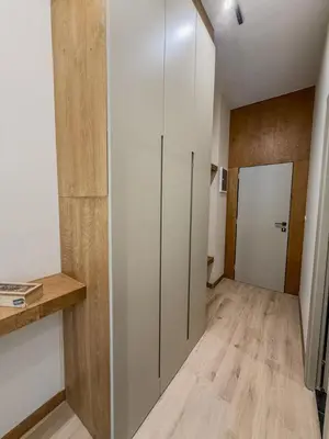 a room with a white closet and a wooden floor at AS Modern Monastiraki Apartment 1A in Athens
