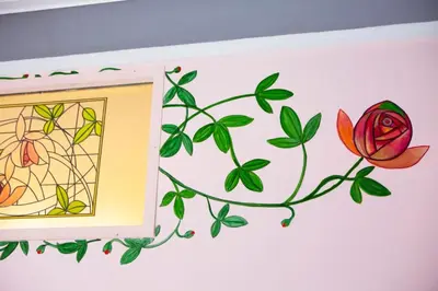 a drawing of a flower on a wall at Eclectic 4-Bed, 4-Bath Apt in Central Athens - AK1 in Athens