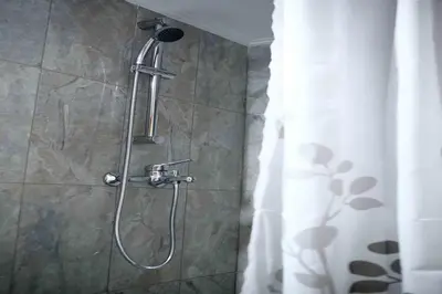 a shower in a bathroom with a shower curtain at Best House, Anakreontos, Perivolaki, Nikaia, P... in Piraeus