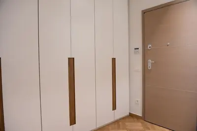 a room with white walls and a door at Katia Modern Apartment in Athens in Athens