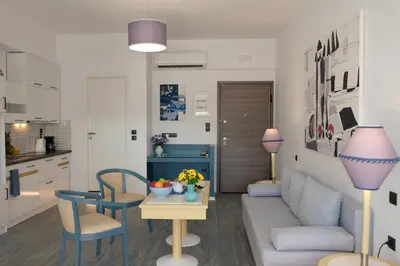 a living room with a couch and a table at STUDIO ANASTASIA in Athens
