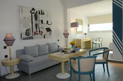 a living room with a couch and a table at STUDIO ANASTASIA in Athens