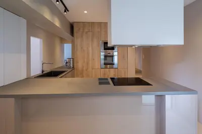 a kitchen with a sink and a counter top at Hippocrates - Faliro deluxe apartment in Athens