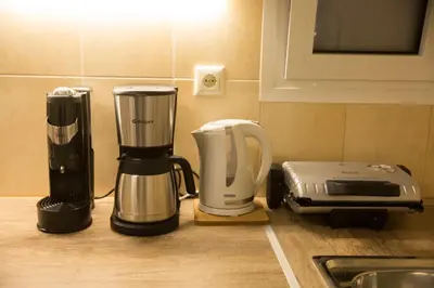 a kitchen counter with a blender and a toaster at Ivannas dream house in Athens