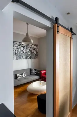 a living room with a couch and a table at The Burton Luxury 1BR in Plaka, Athens in Athens