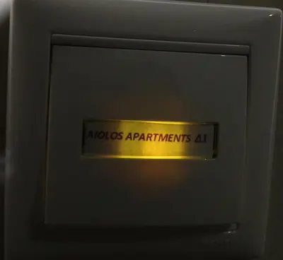 a sign on a door with the words idiotsariansaturdaysaturdaysaturdaysaturdaysaturdaysaturdays at Aiolos Apartments Ermou 64 Monastiraki, Plaka 4th floor in Athens