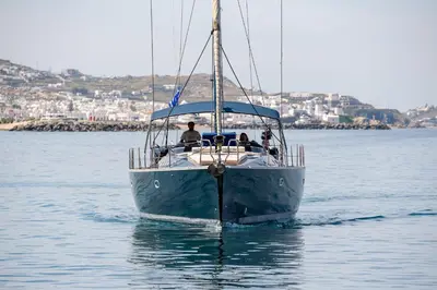 a boat in the water with two people on it at Boat Aiolis in the Athenian Riviera! in Athens