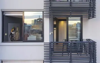 a balcony with two chairs and a window at Ma Maison No3 Downtown Loft,320Mbps,Acropolis Walk in Athens