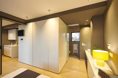 a room with white walls and a yellow table at Ma Maison No3 Downtown Loft,320Mbps,Acropolis Walk in Athens