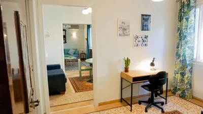 a room with a desk and a chair in a room at Comfortable Apartment in Kallithea by Athenian Homes in Athens