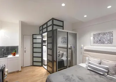 a bedroom with a large bed and a bathroom at The Monastiraki Metro Lux Suite! in Athens
