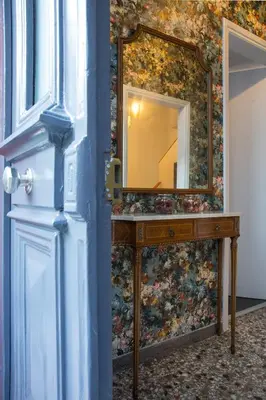 a dressing table with a mirror on a wall at Vol.3 in Athens