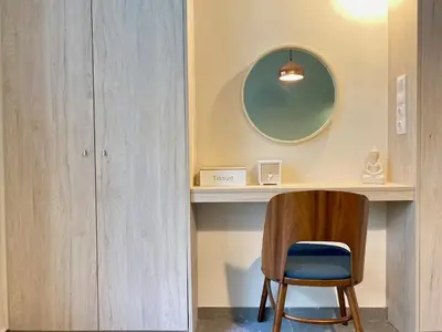 a room with a desk with a chair and a mirror at 27 times Athens in Athens