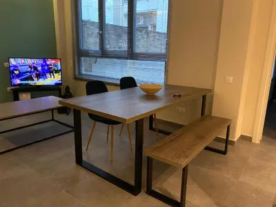 a dining room table with a bowl on top of it at 27 times Athens in Athens