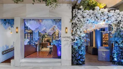 a store entrance with blue and white decorations at Gatsby Athens in Athens