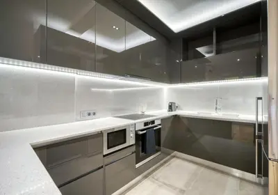 a kitchen with stainless steel cabinets and a microwave at Stunning Central 180m2 4 Bedroom 3 Bathroom, Sleeps 10 Guests in Athens