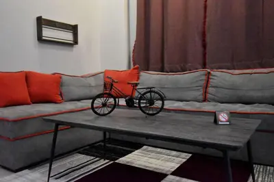 a bike on a table in front of a couch at Rock, few steps from Acropolis rocks! in Athens