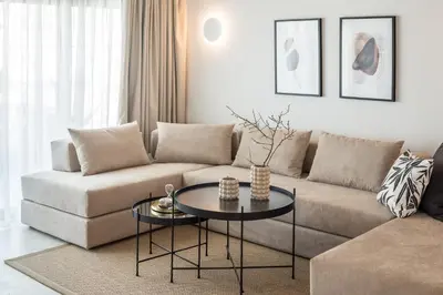 a living room with a couch and a table at Urban Suites in Athens