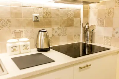 a kitchen with a sink and a counter top at Hidden Paradise in Piraeus