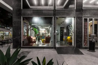 a lobby of a building with glass doors at Max Brown Hotel Downtown Part of Sircle Collection Formally known as Dave Red in Athens