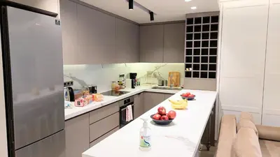 a kitchen with a counter with fruit on it at Luxurious apartment in Acropolis in Athens