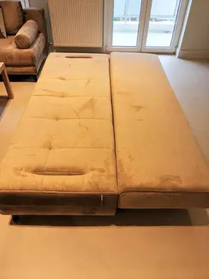 a large bed sitting on the floor in a room at Luxurious minimal apartment in Acropolis in Athens