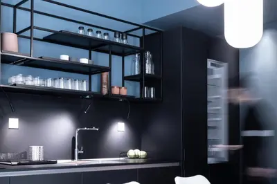 a kitchen with black walls and a sink and shelves at The H Experience Boutique Apartments Athens - free parking and fiber internet in Athens