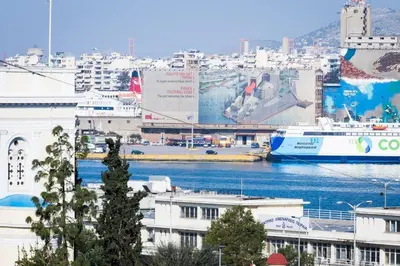 a city with a harbor with boats in the water at Neoclassical apartment with 3 bedrooms in Piraeus in Piraeus