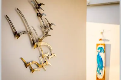 a group of antlers hanging on a wall at Neoclassical apartment with 2 bedrooms in Piraeus in Piraeus