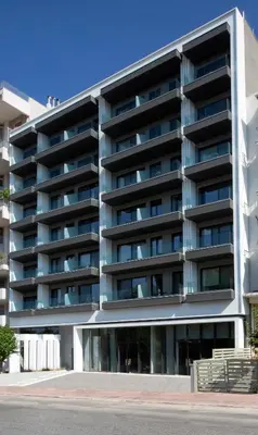 a large apartment building with a parking lot at Athens Panorama Project in Athens