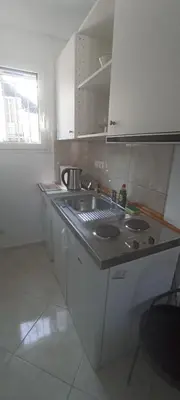a kitchen with a sink and a counter top at Michali's Koukaki Apartment (metro Sygrou/Fix) in Athens