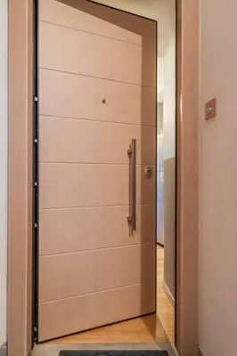 a garage door with a mirror in a room at Lux clevercomfy appartmentthe center of Athens in Athens