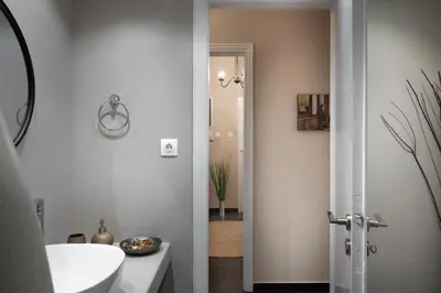 a bathroom with a sink and a white tub at Absolute Athens XI in Athens
