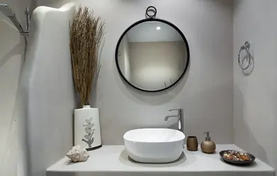 a bathroom with a white sink and a mirror at Absolute Athens XI in Athens