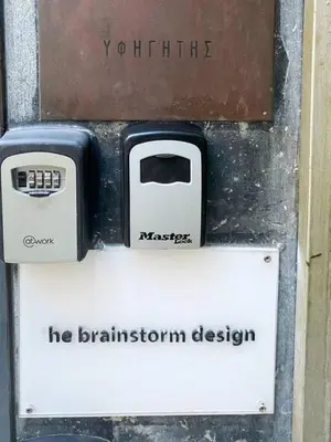 a sign that says he brainstorming design on a mailbox at Exclusive New Modern Apartment at Syntagma Square in Athens