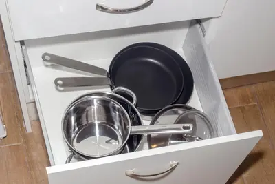 a drawer filled with pots and pans in a kitchen at Stylish Loft In Athens VIPGreece in Athens