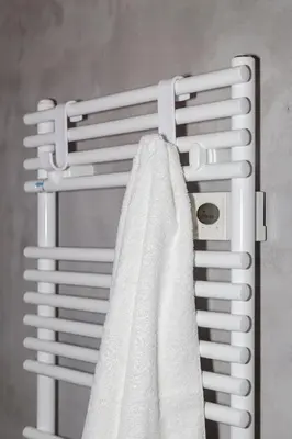 a towel rack with a white shower curtain at Stylish Loft In Athens VIPGreece in Athens